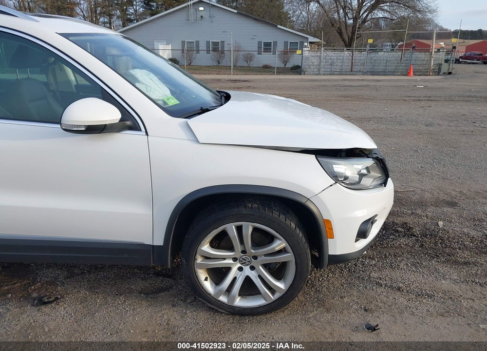2012 VOLKSWAGEN TIGUAN SEL VIN: WVGBV7AX9CW571157