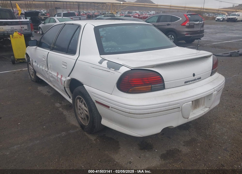 1998 PONTIAC GRAND AM SE CMI VIN: 1G2NE52T7WM513702