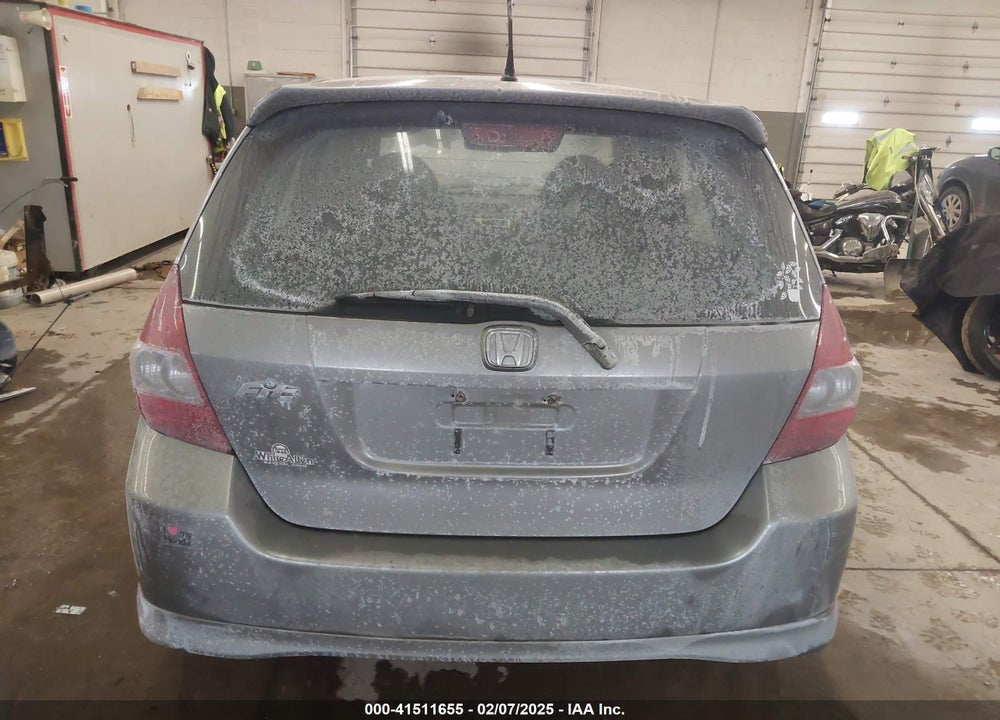 2007 HONDA FIT VIN: JHMGD38657S000389