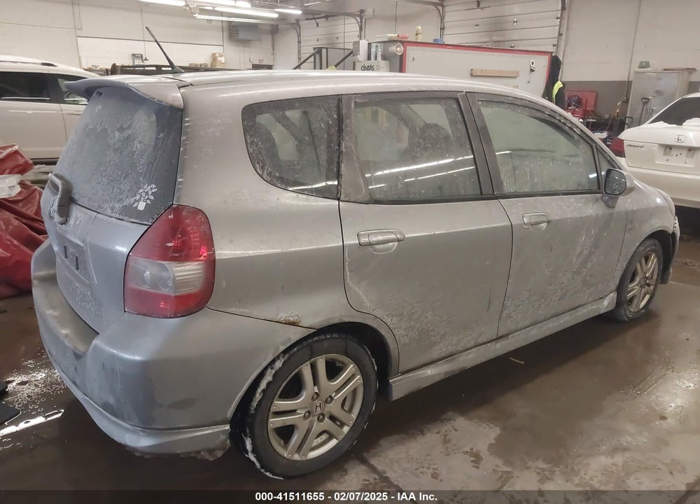 2007 HONDA FIT VIN: JHMGD38657S000389