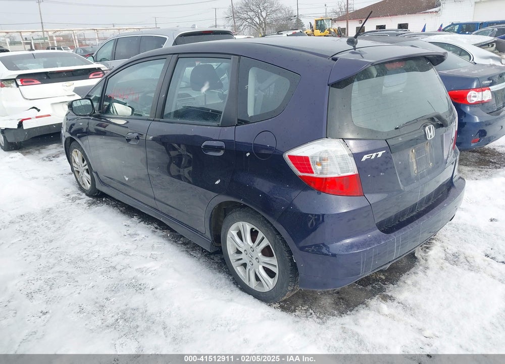 2010 HONDA FIT VIN: JHMGE8H49AC020008