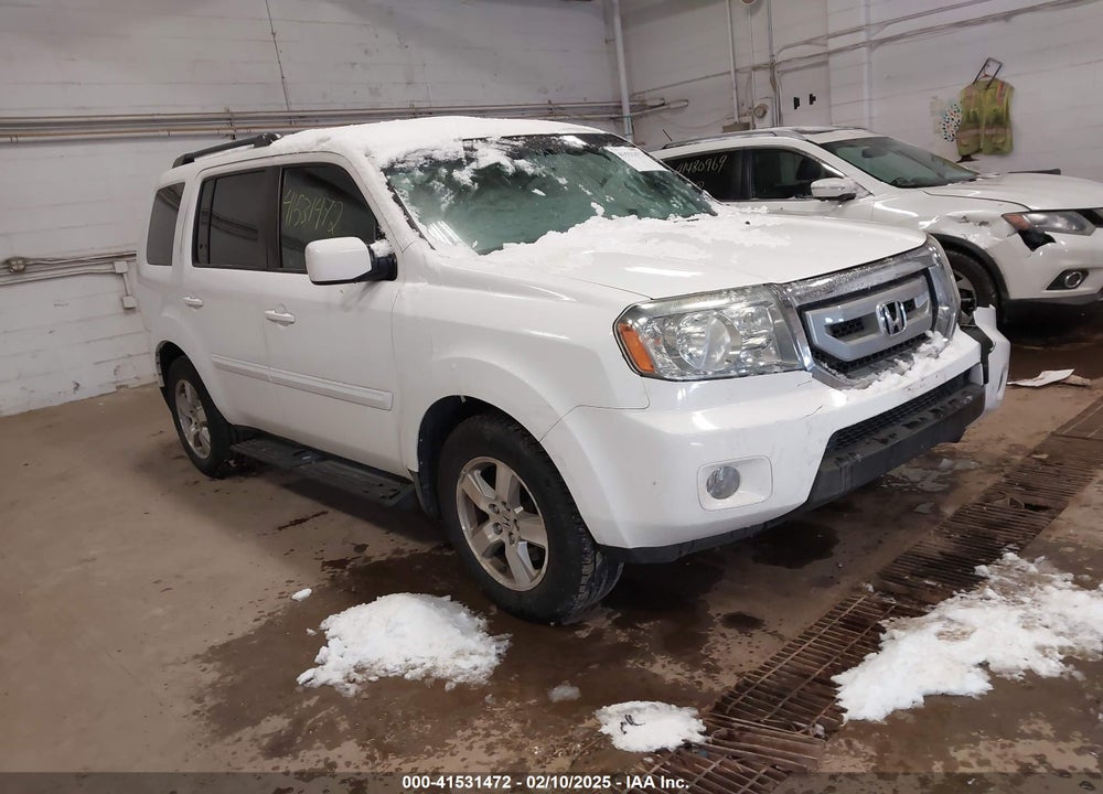2010 HONDA PILOT EX-L VIN: 5FNYF4H64AB015928