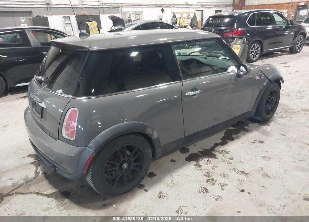 2006 MINI COOPER VIN: WMWRC33586TK67107