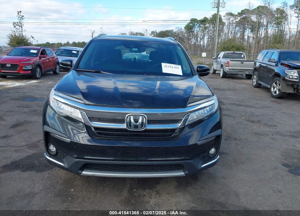 2021 HONDA PILOT 2WD TOURING 7 PASSENGER VIN: 5FNYF5H68MB000651