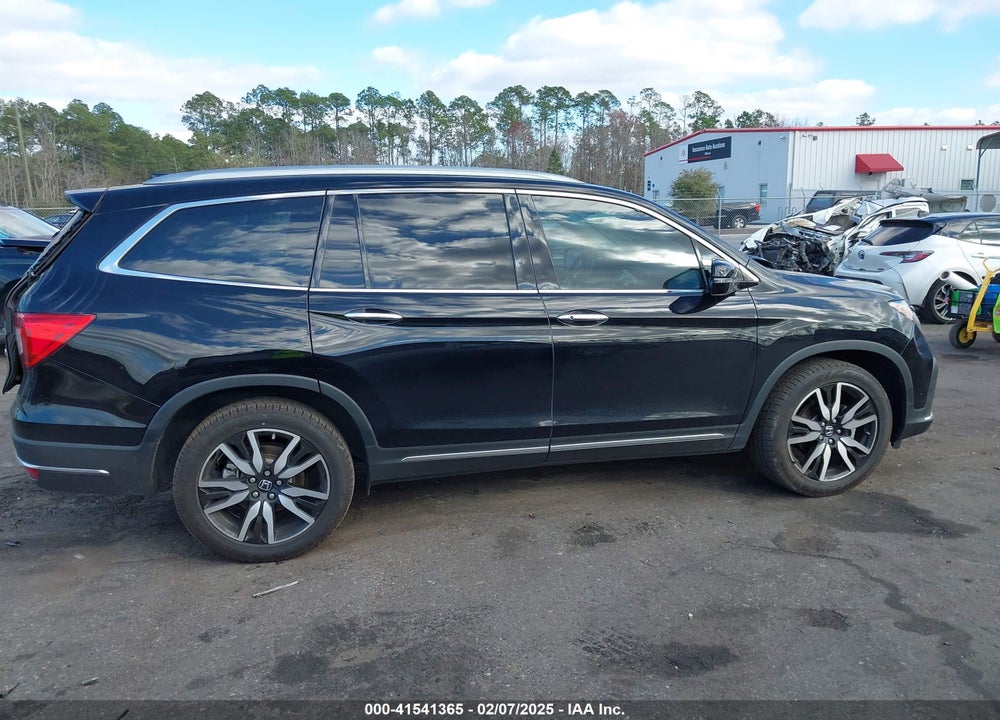 2021 HONDA PILOT 2WD TOURING 7 PASSENGER VIN: 5FNYF5H68MB000651