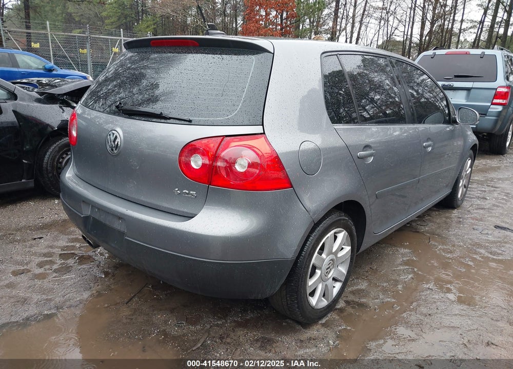 2009 VOLKSWAGEN RABBIT VIN: WVWDB71K69W142447