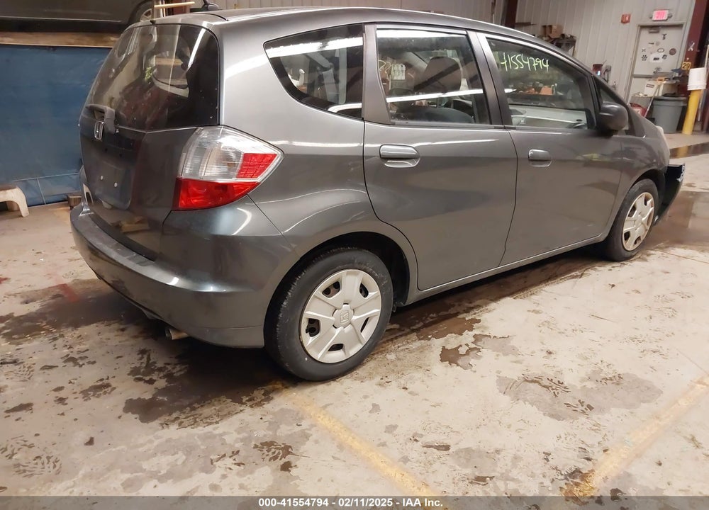2013 HONDA FIT VIN: JHMGE8H30DC027988