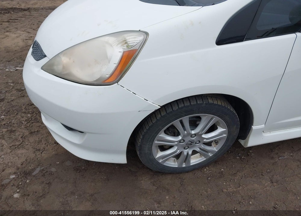 2009 HONDA FIT VIN: JHMGE88459S026843