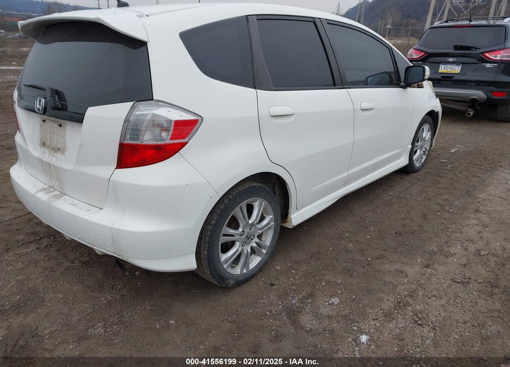 2009 HONDA FIT VIN: JHMGE88459S026843