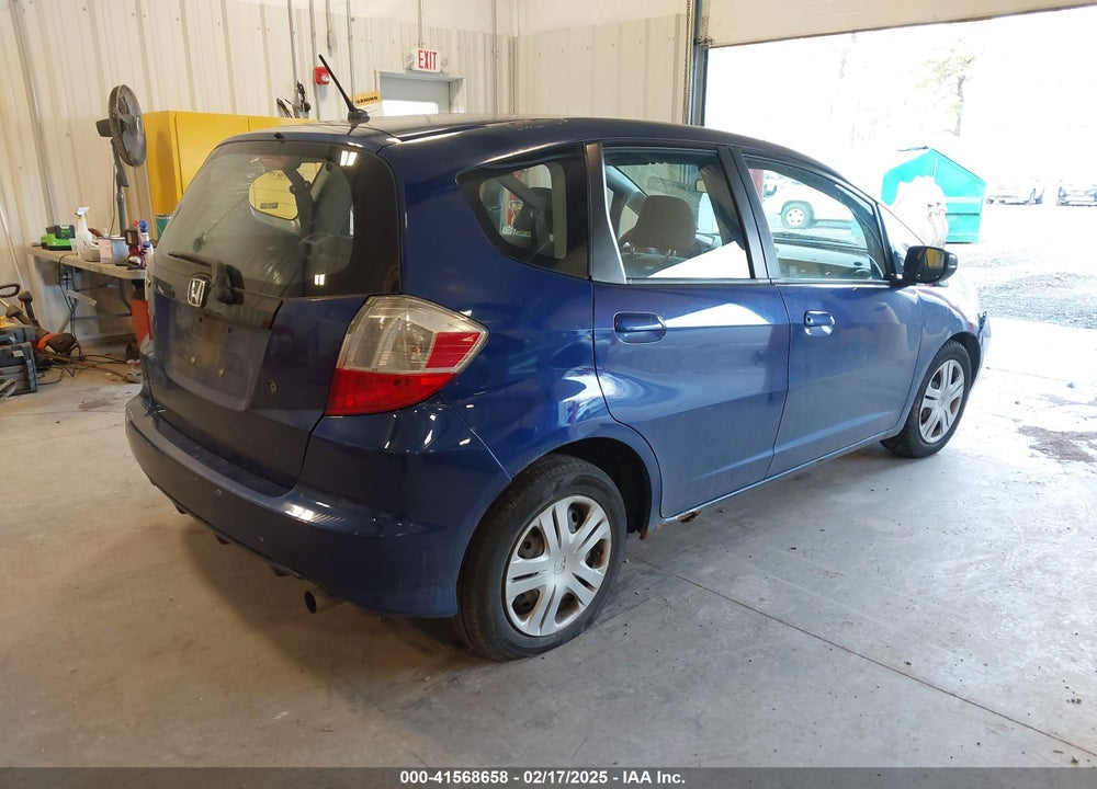 2009 HONDA FIT VIN: JHMGE88219S047560