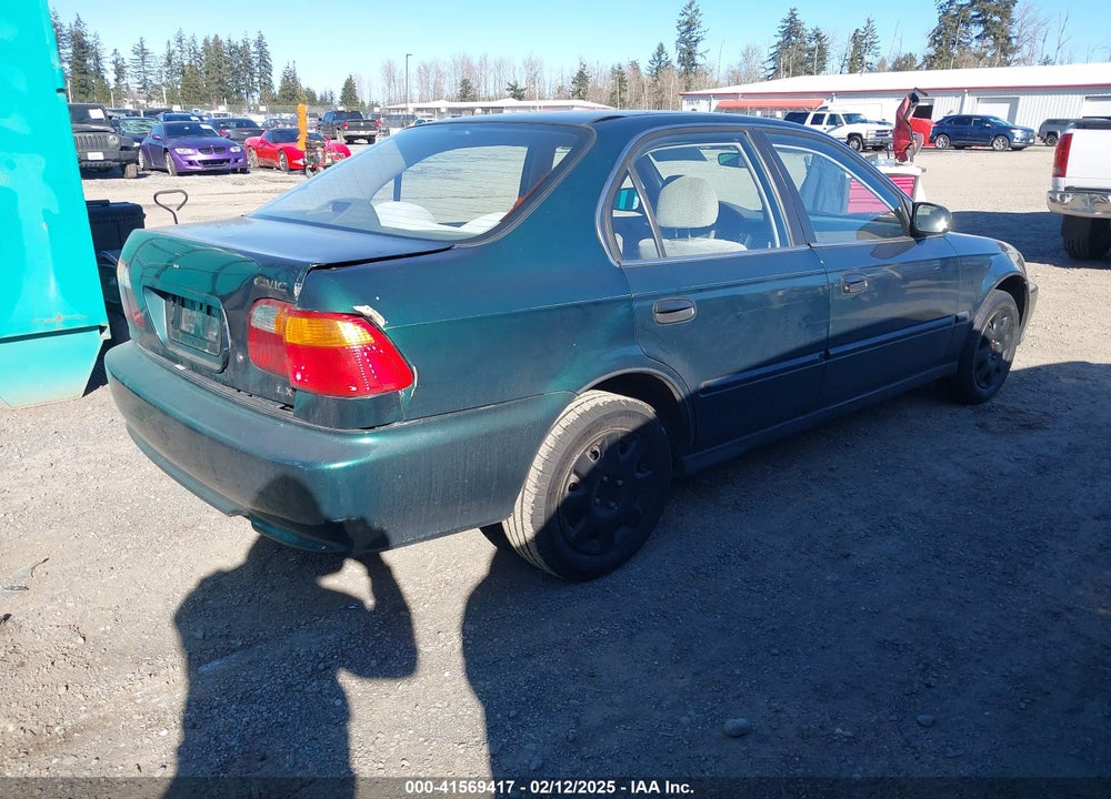 1999 HONDA CIVIC LX VIN: 1HGEJ6679XL025063