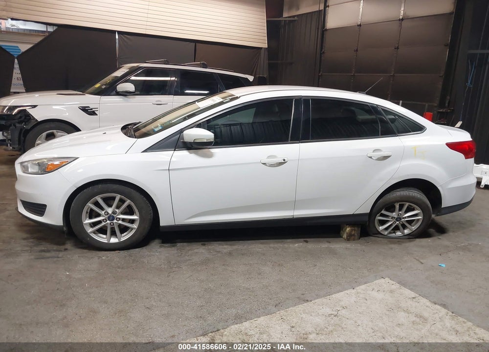 2015 FORD FOCUS VIN: 1FADP3F25FL372101