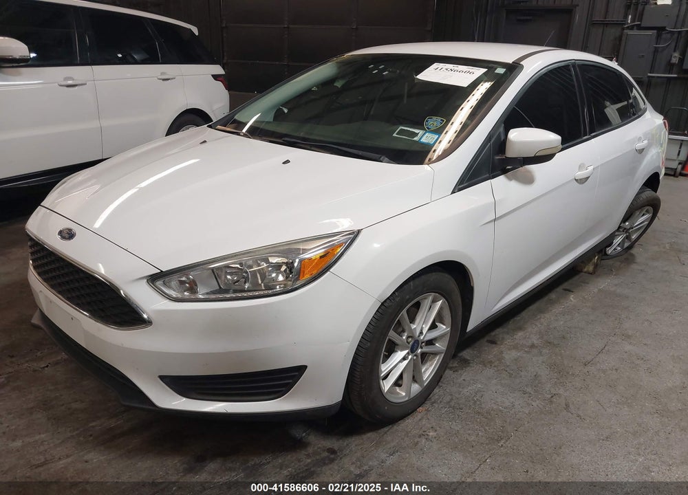 2015 FORD FOCUS VIN: 1FADP3F25FL372101