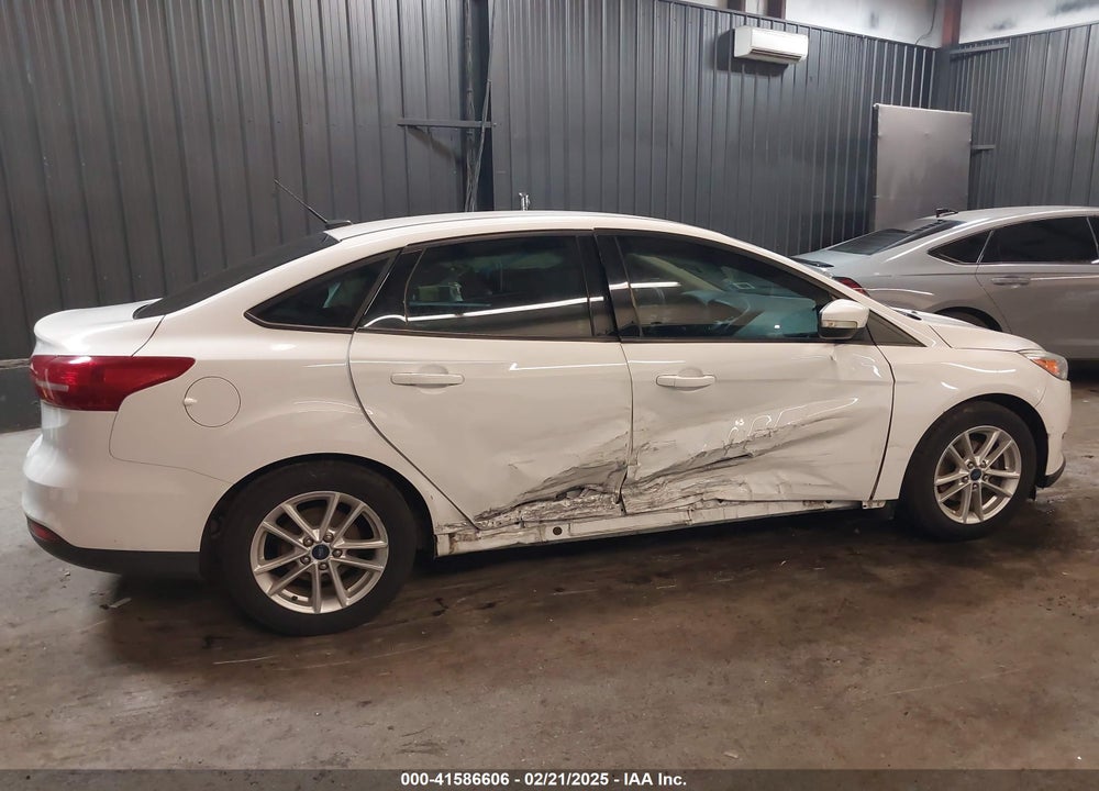 2015 FORD FOCUS VIN: 1FADP3F25FL372101