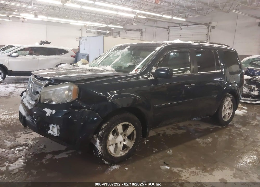 2011 HONDA PILOT EX-L VIN: 5FNYF4H55BB043150