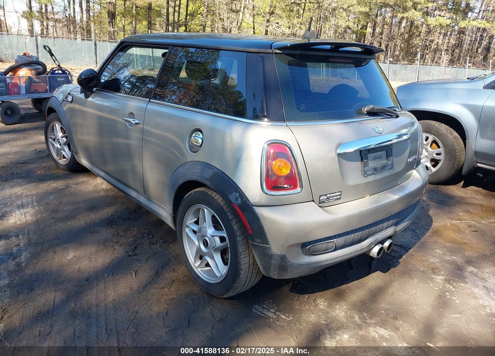 2007 MINI COOPER VIN: WMWMF73597TV31946