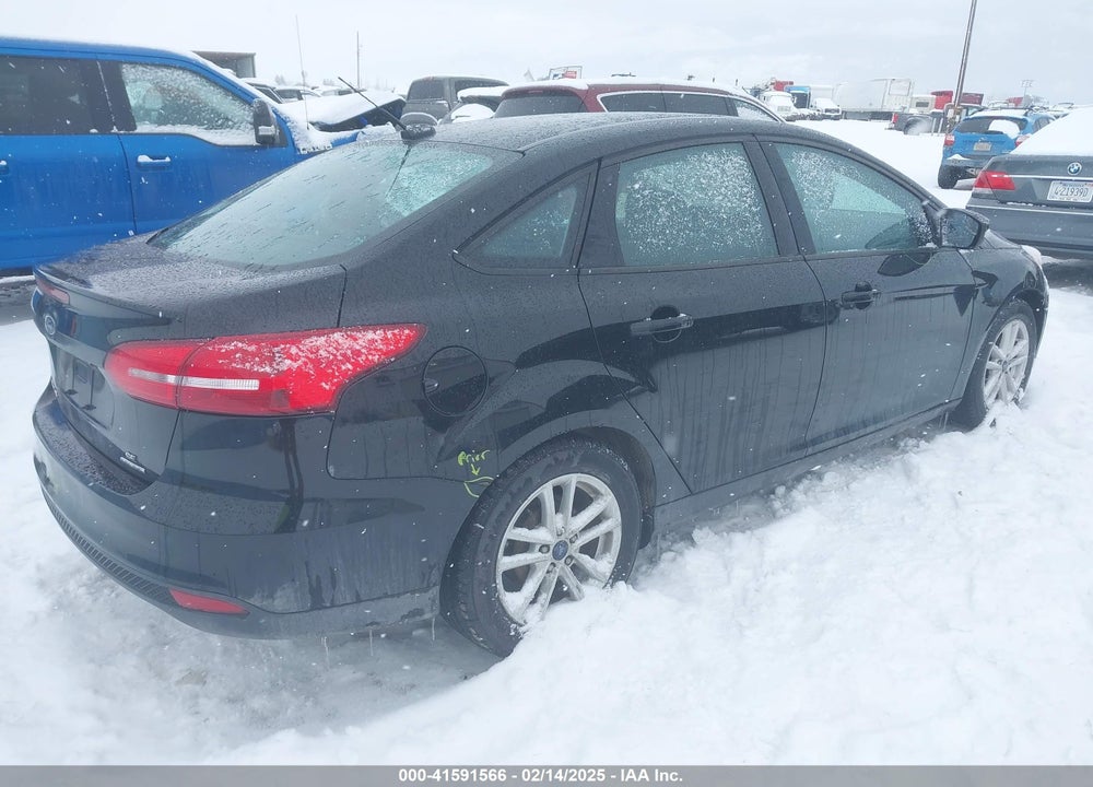 2016 FORD FOCUS SE VIN: 1FADP3F23GL312223