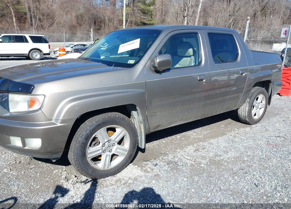 2010 HONDA RIDGELINE RTL VIN: 5FPYK1F54AB008506