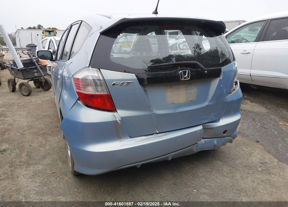 2009 HONDA FIT VIN: JHMGE884X9S056324