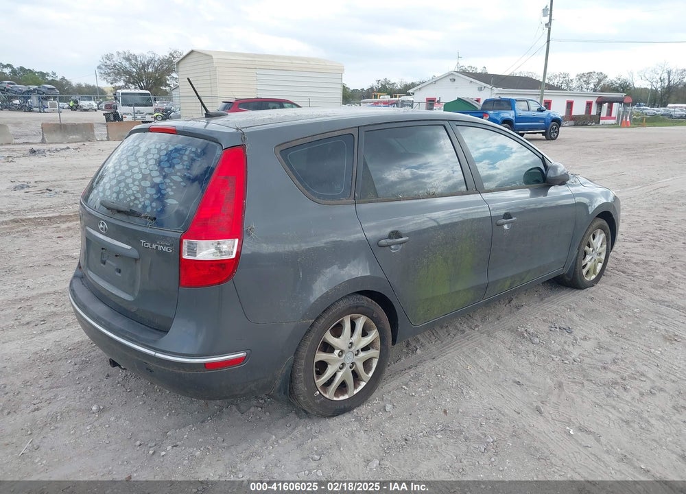 2009 HYUNDAI ELANTRA TOURING VIN: KMHDC86E19U033522