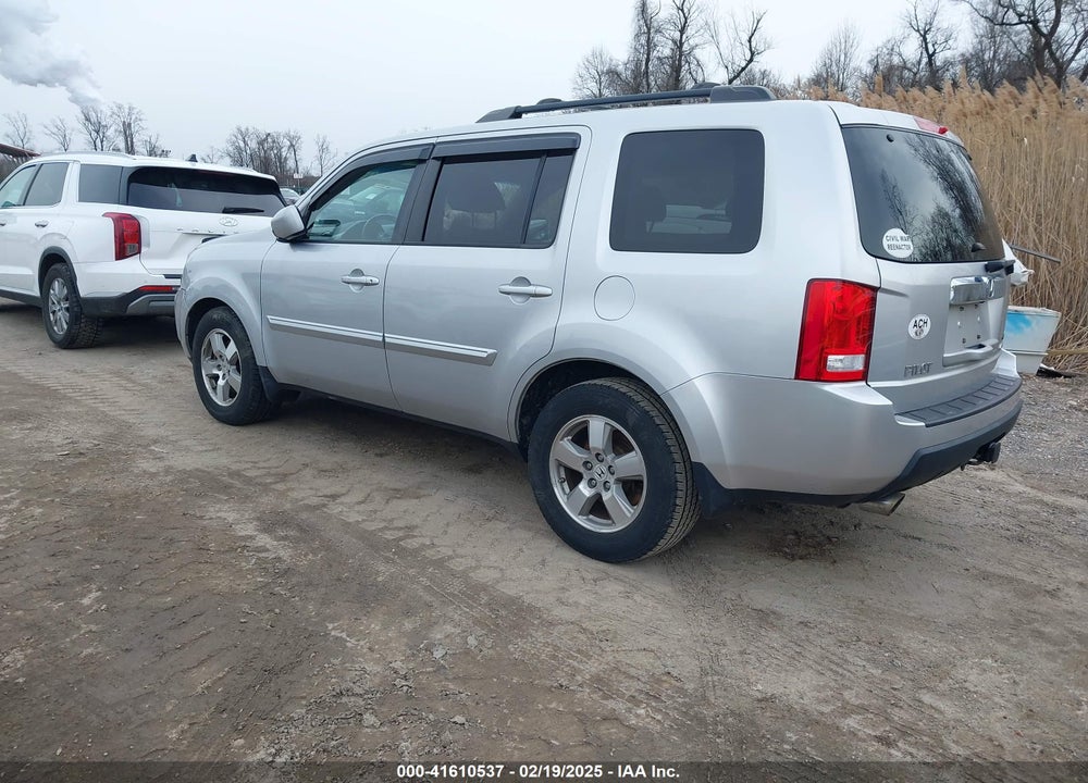 2011 HONDA PILOT EX-L VIN: 5FNYF4H59BB002357