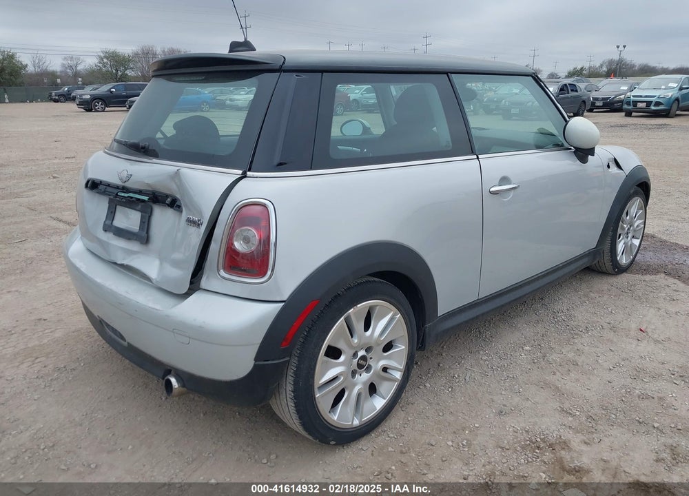 2010 MINI COOPER VIN: WMWMF3C54ATZ22597