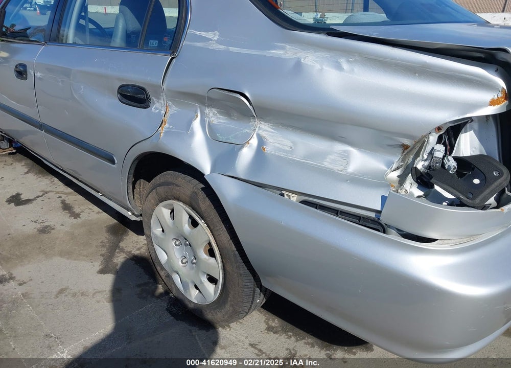 1999 HONDA CIVIC LX VIN: JHMEJ6670XS000958