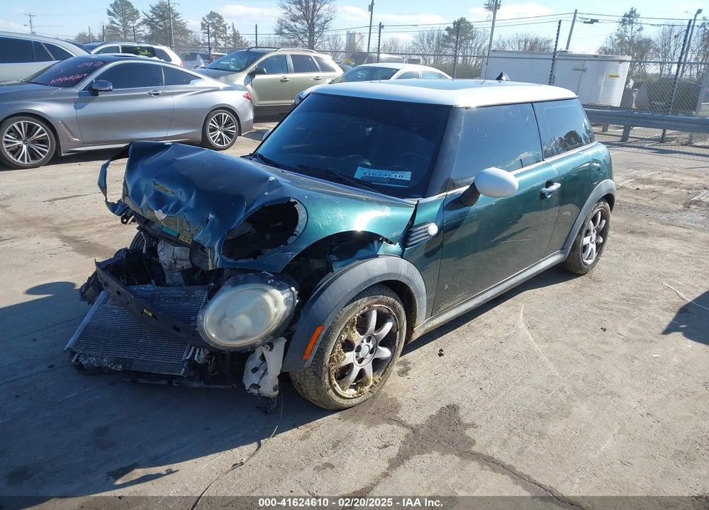 2009 MINI COOPER VIN: WMWMF33549TW71172
