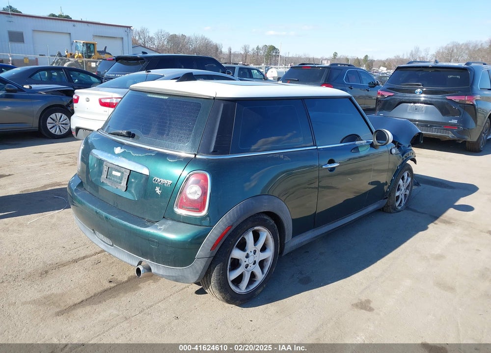 2009 MINI COOPER VIN: WMWMF33549TW71172