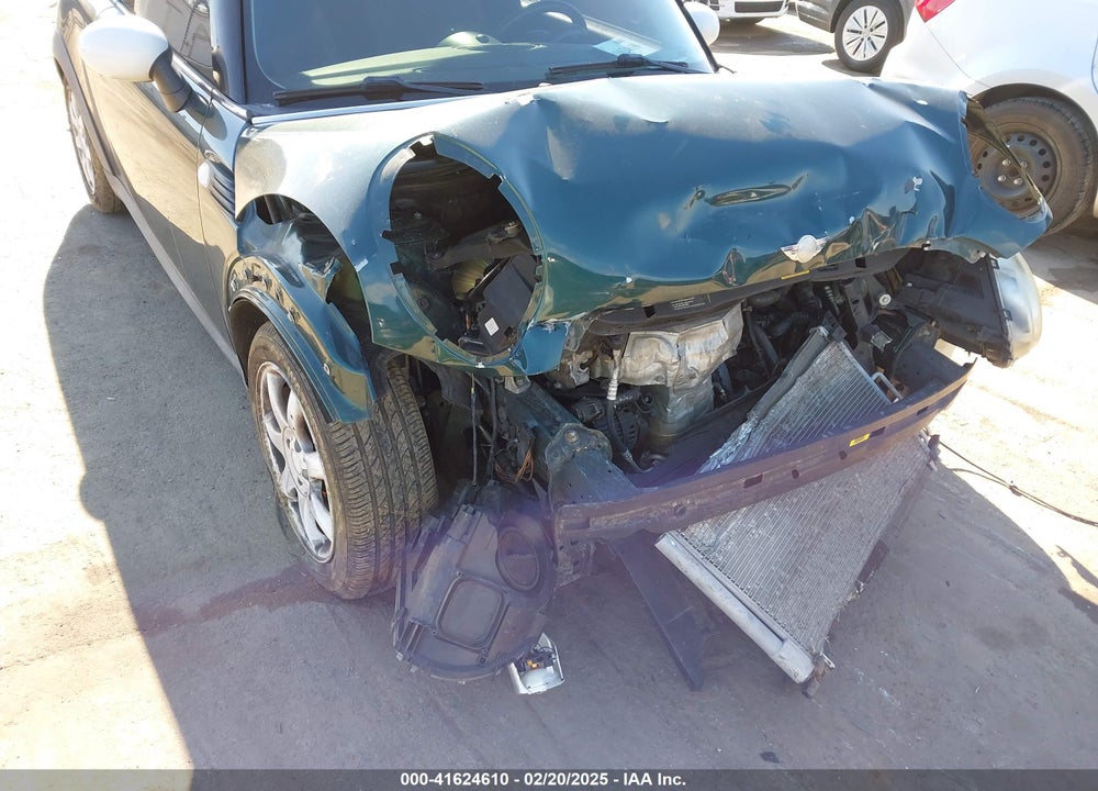 2009 MINI COOPER VIN: WMWMF33549TW71172