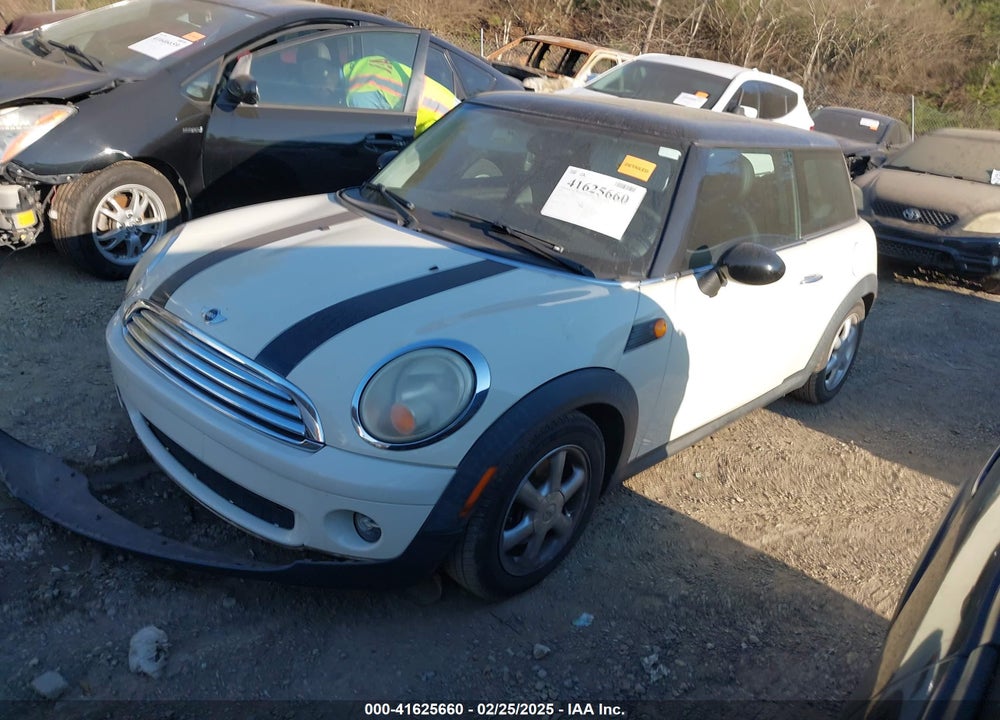 2009 MINI COOPER VIN: WMWMF33509TU72507