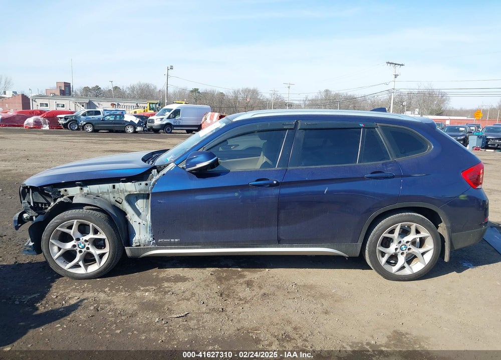 2014 BMW X1 VIN: WBAVL1C59EVY11121
