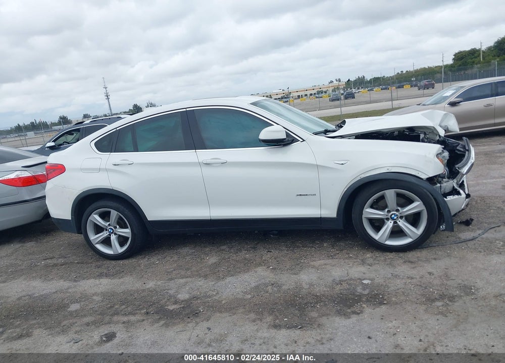 2015 BMW X4 VIN: 5UXXW3C55F0M87113