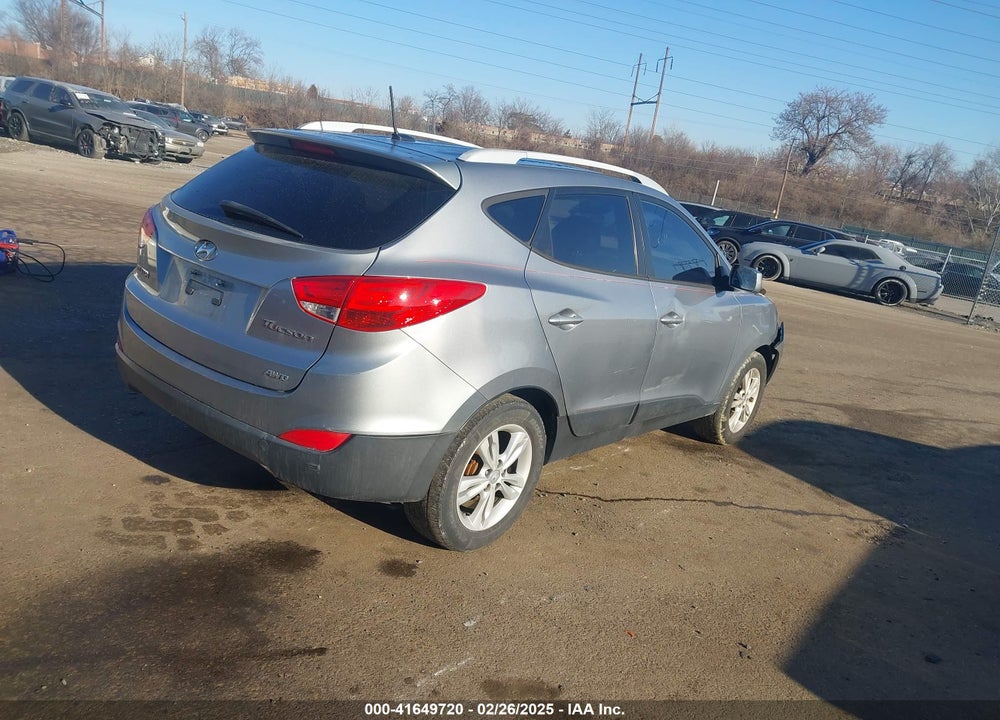 2010 HYUNDAI TUCSON VIN: KM8JUCAC2AU093287