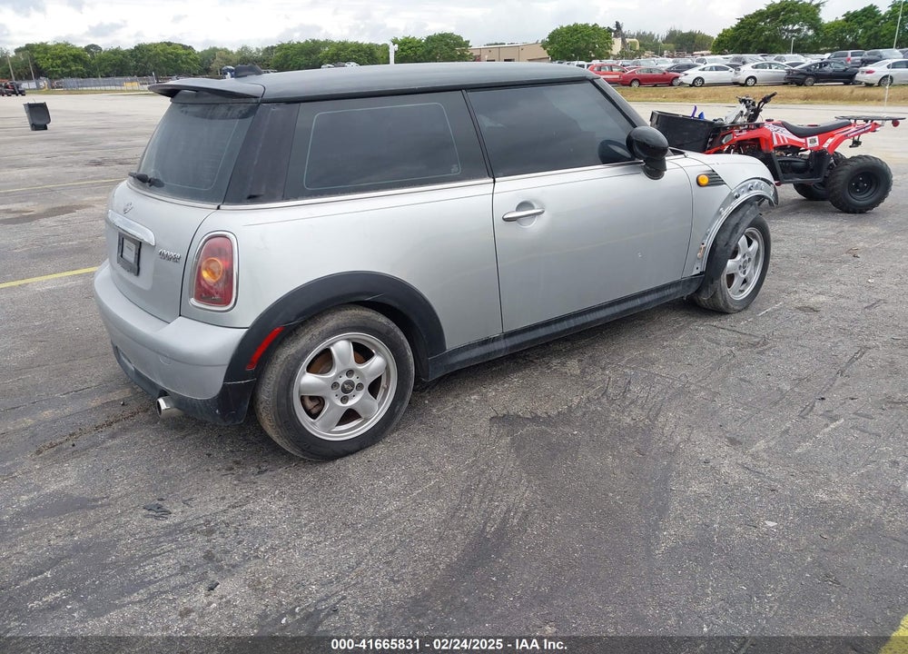 2010 MINI COOPER VIN: WMWMF3C53ATU78676