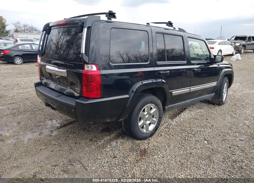 2006 JEEP COMMANDER VIN: 1J8HG58206C143323