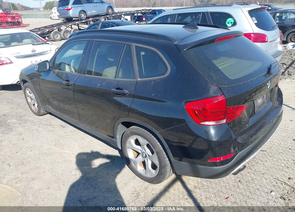 2014 BMW X1 VIN: WBAVM1C58EVW49771