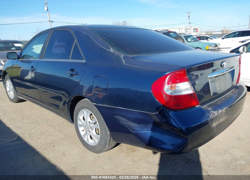 2002 TOYOTA CAMRY LE VIN: JTDBE32K720083052
