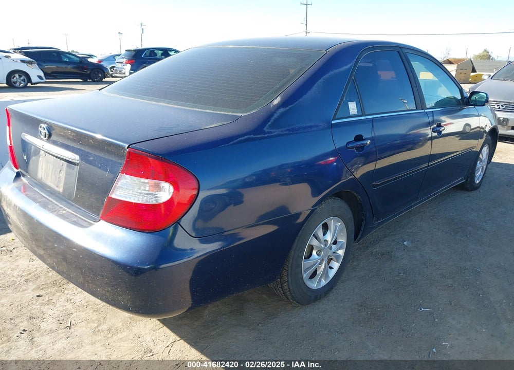 2002 TOYOTA CAMRY LE VIN: JTDBE32K720083052