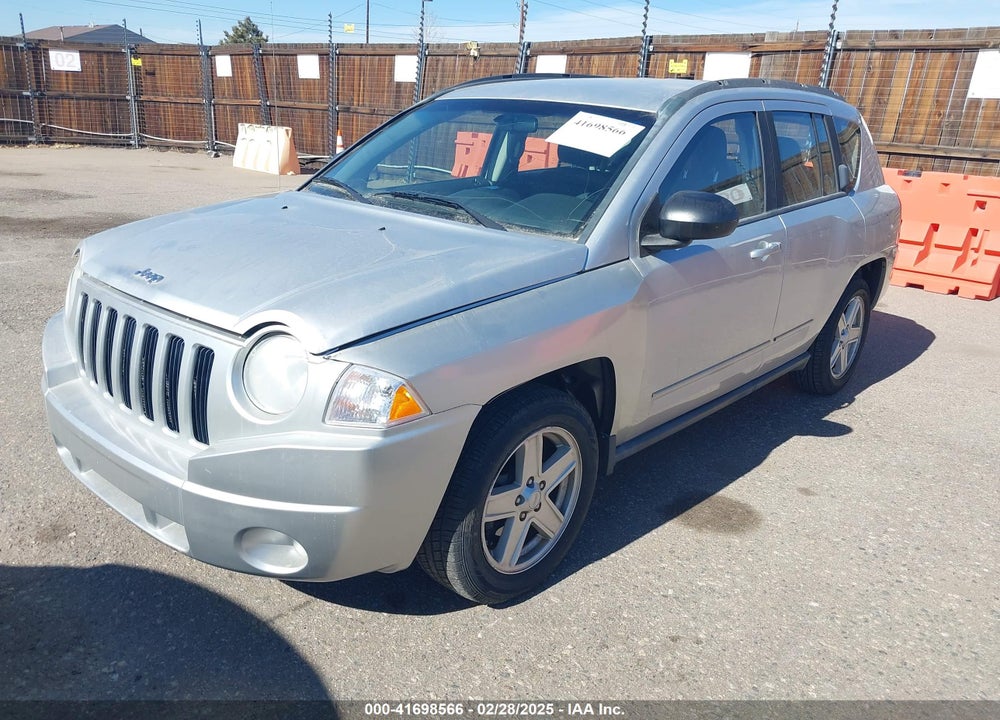 2010 JEEP COMPASS VIN: 1J4NF4FB3AD553170