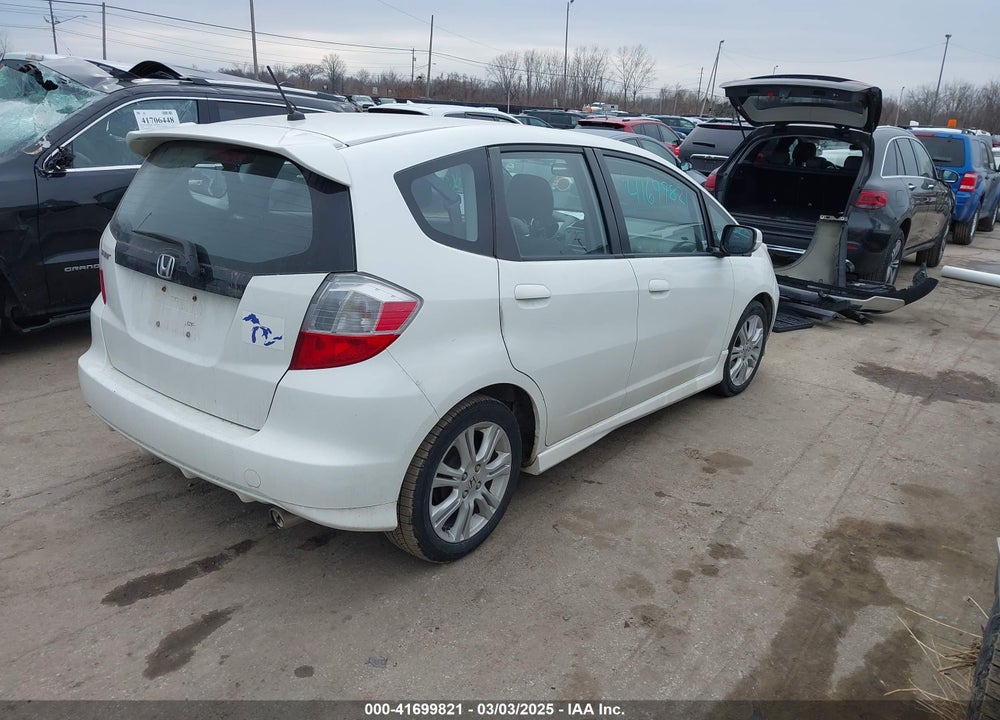 2010 HONDA FIT SPORT VIN: JHMGE8H6XAS028402