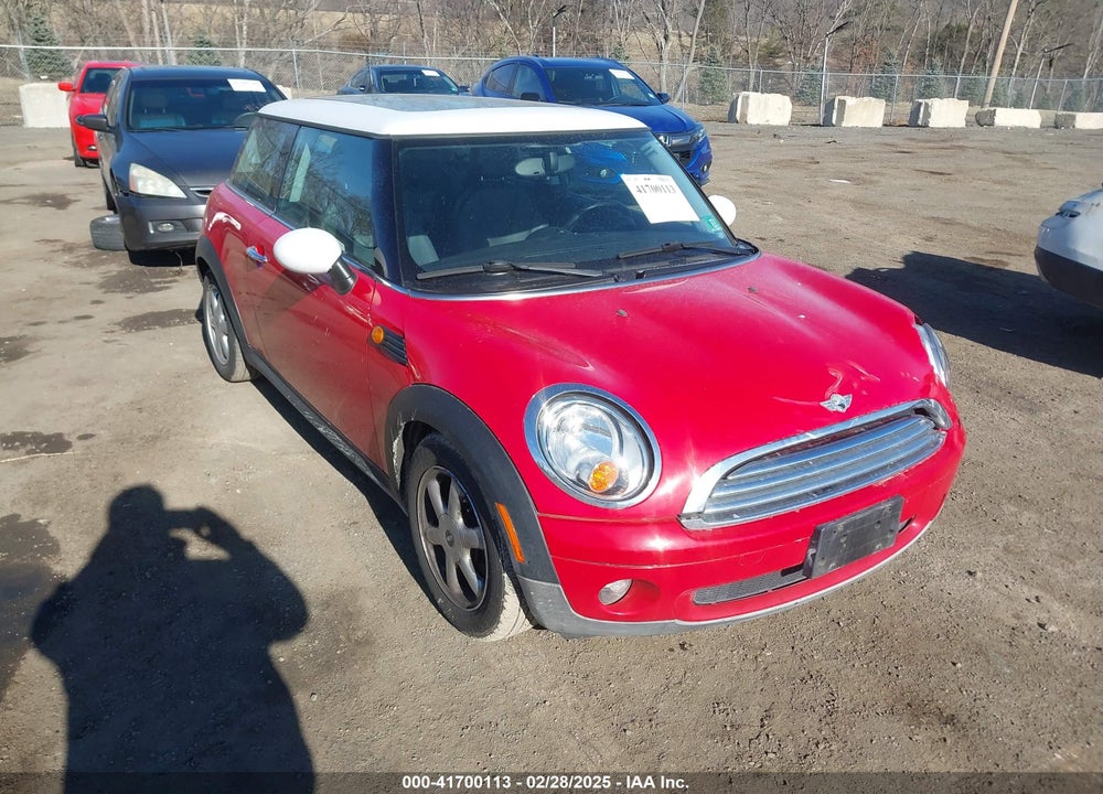 2009 MINI COOPER VIN: WMWMF33539TT68397