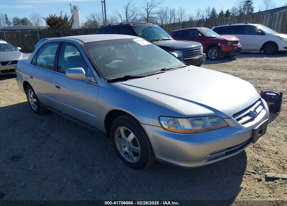 2002 HONDA ACCORD 2.3 LX VIN: 1HGCG56542A144609