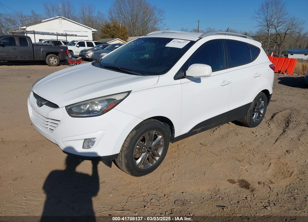 2014 HYUNDAI TUCSON SE VIN: KM8JUCAG7EU802658