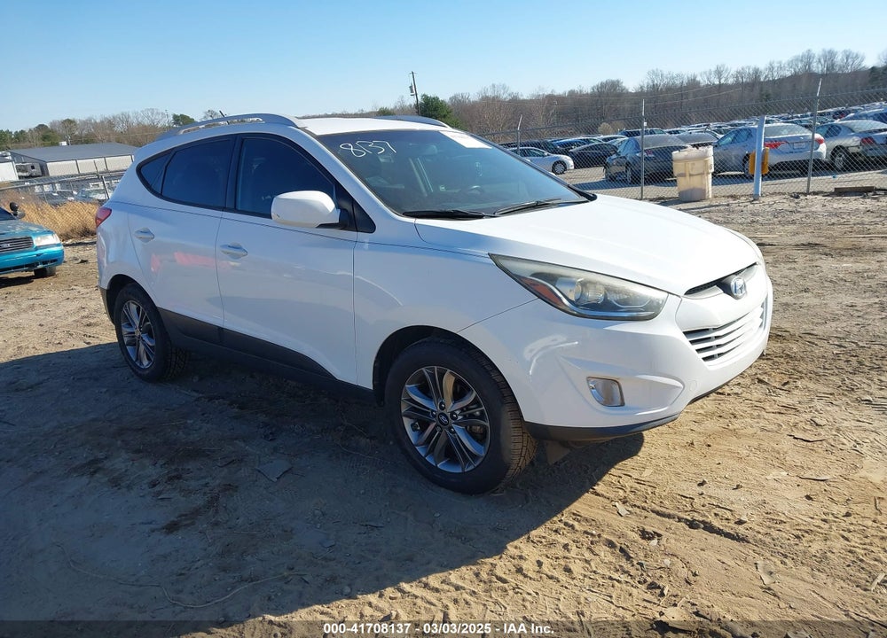 2014 HYUNDAI TUCSON SE VIN: KM8JUCAG7EU802658