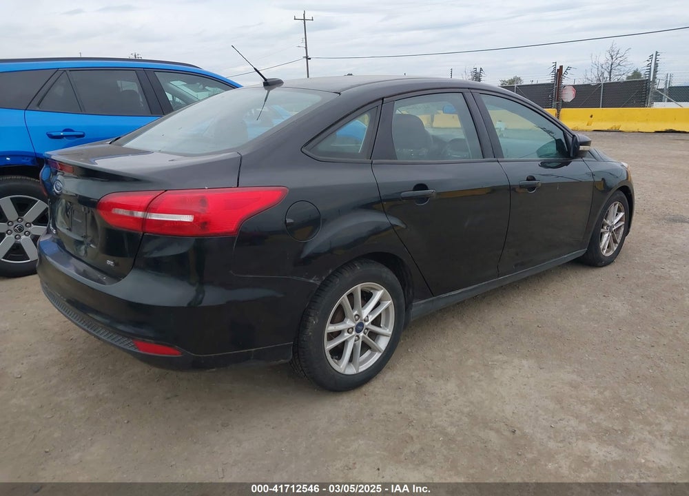 2016 FORD FOCUS SE VIN: 1FADP3F22GL285354