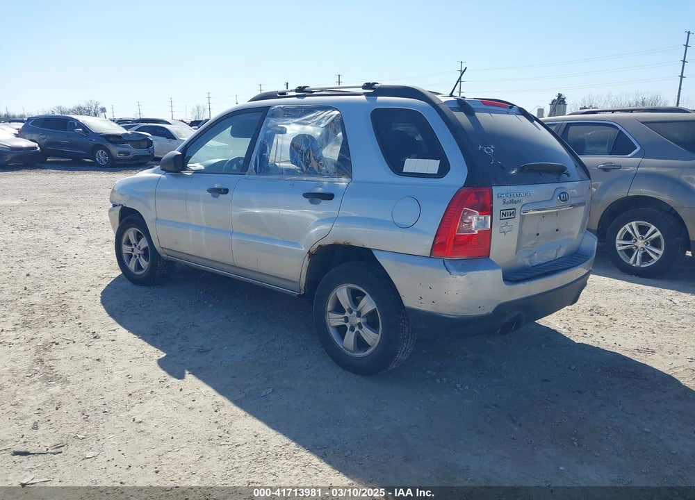 2009 KIA SPORTAGE VIN: KNDJF724097556129
