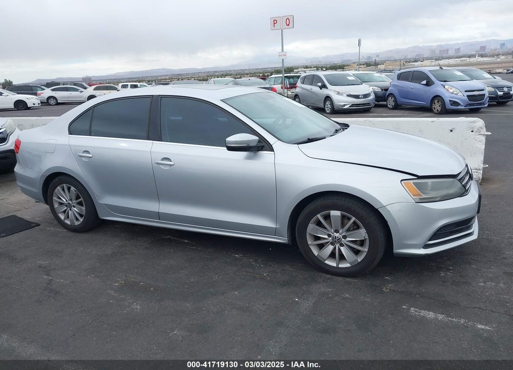 2015 VOLKSWAGEN JETTA 1.8T SE VIN: 3VWD17AJ7FM226182