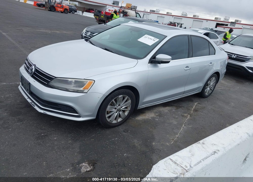 2015 VOLKSWAGEN JETTA 1.8T SE VIN: 3VWD17AJ7FM226182