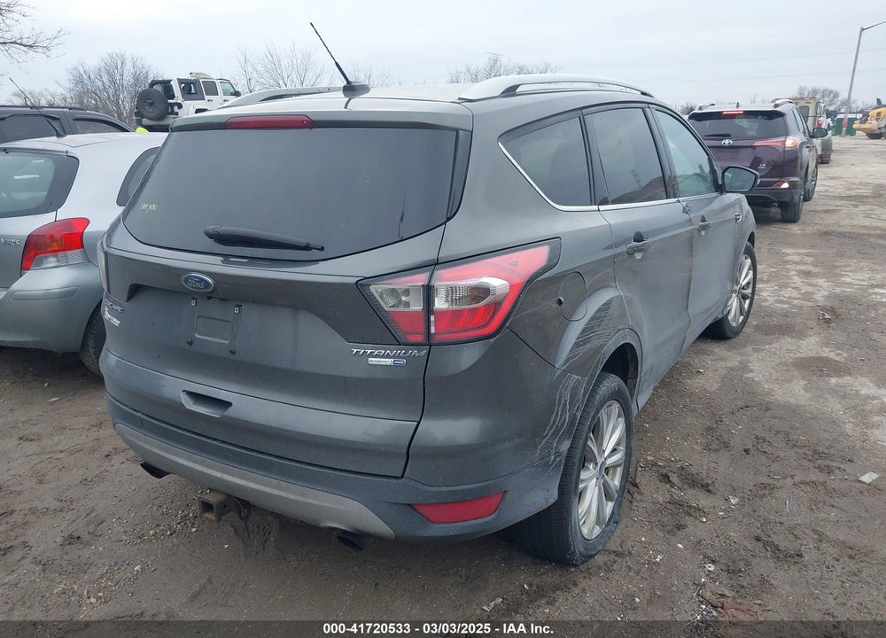 2017 FORD ESCAPE TITANIUM VIN: 1FMCU9J94HUD49939